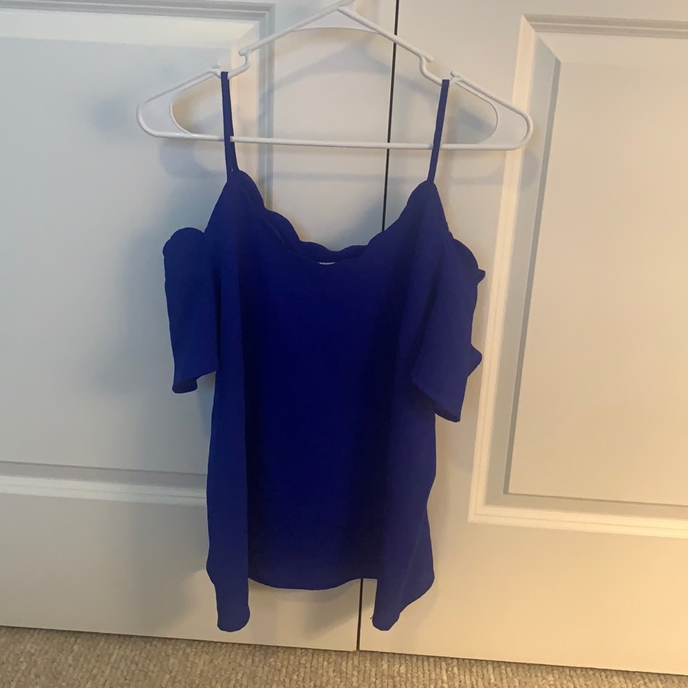 Large, off the shoulder blue blouse